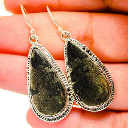 Sterling silver teardrop pyrite agate earrings with textured bezel, fishhook backs