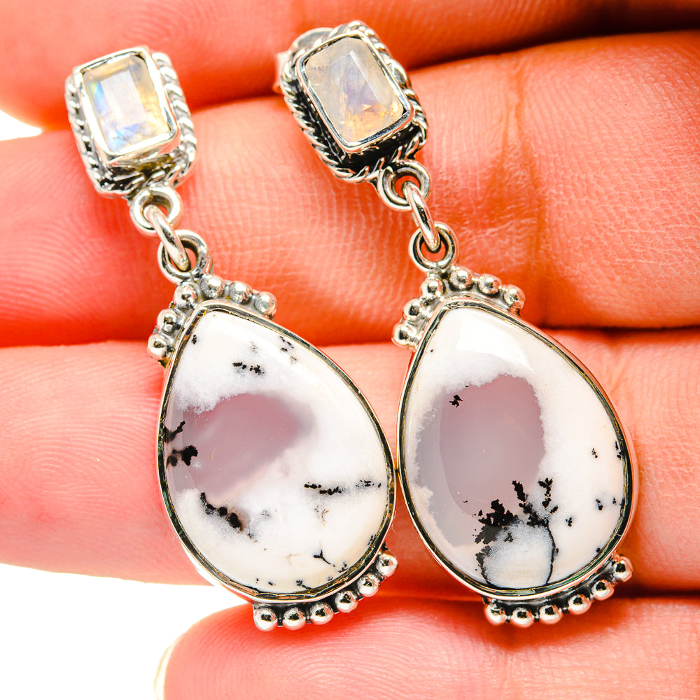 Sterling silver dangle earrings: moonstone tops with pear drops, white stone with black dendrites