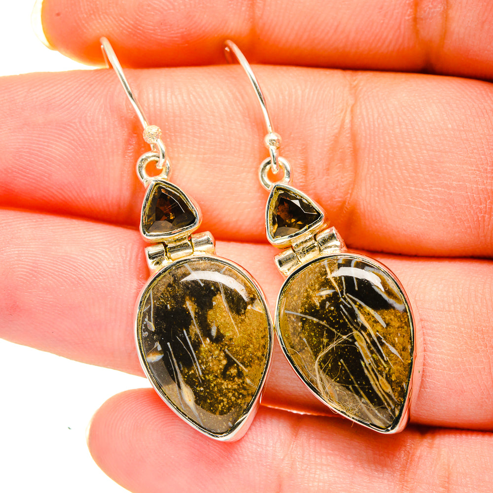 Agate drop earrings with dark gold-speckled teardrop stones and silver hooks