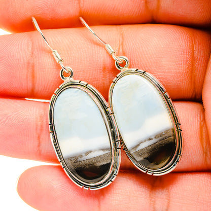 Oval opal drop earrings in silver, white stone with gray band and mirror-like backing