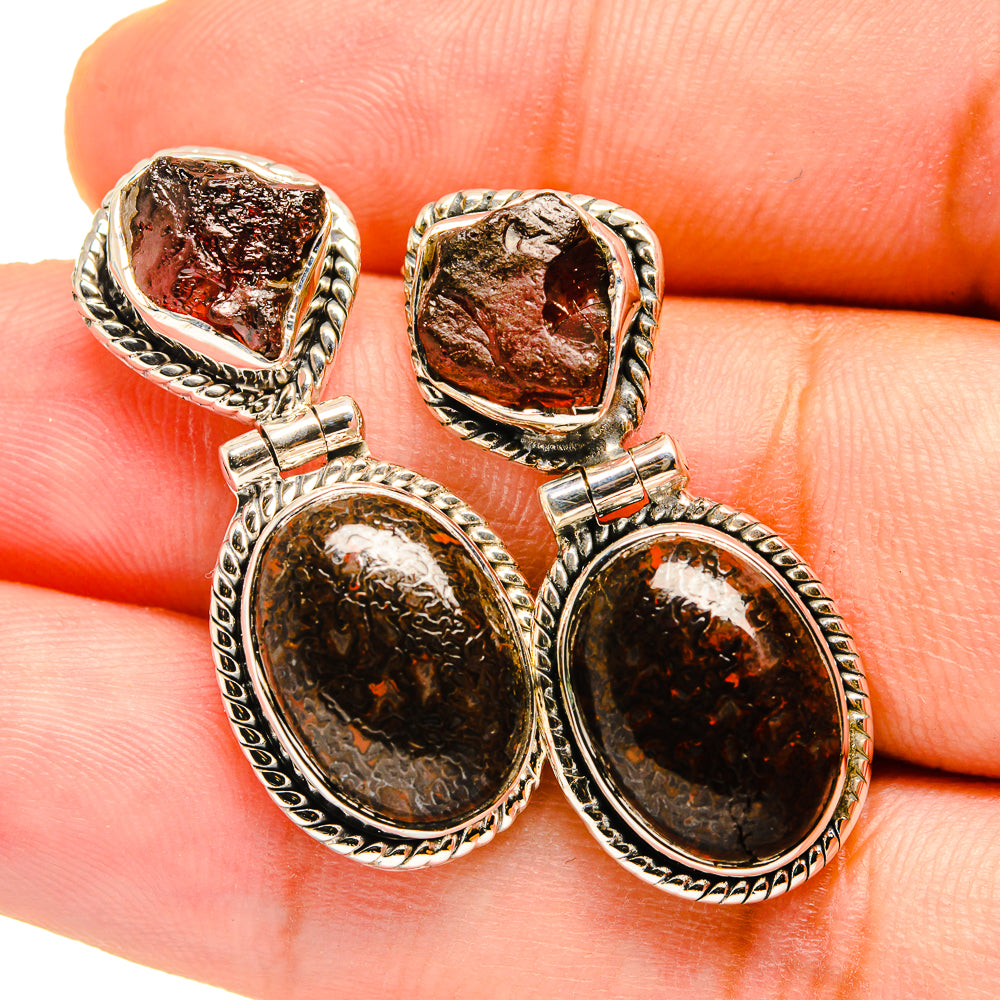 925 sterling silver earrings with dark oval stones and reddish mineral details