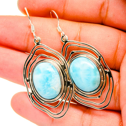 Sterling silver larimar drop earrings with oval blue stones, layered frames