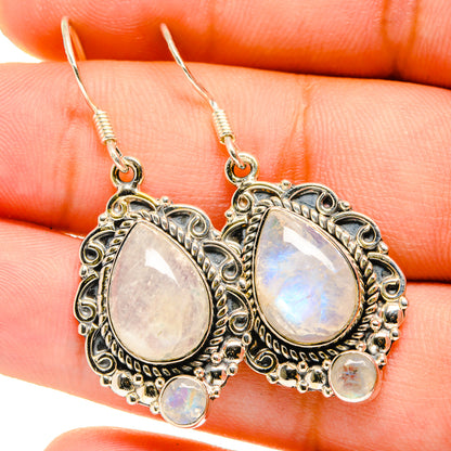 Sterling silver rainbow moonstone drop earrings with oval stones and small round accents