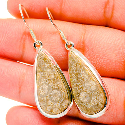 Sterling silver teardrop coral dangle earrings with gold fossil-textured stone and hooks