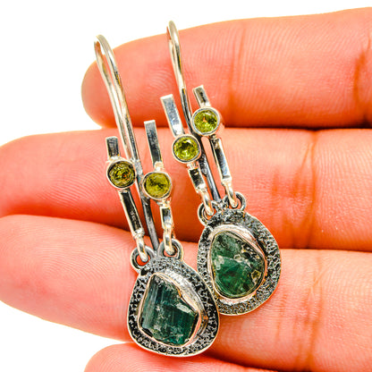 Sterling silver dangle earrings with oval green chrysoprase stones and peridot bead tops