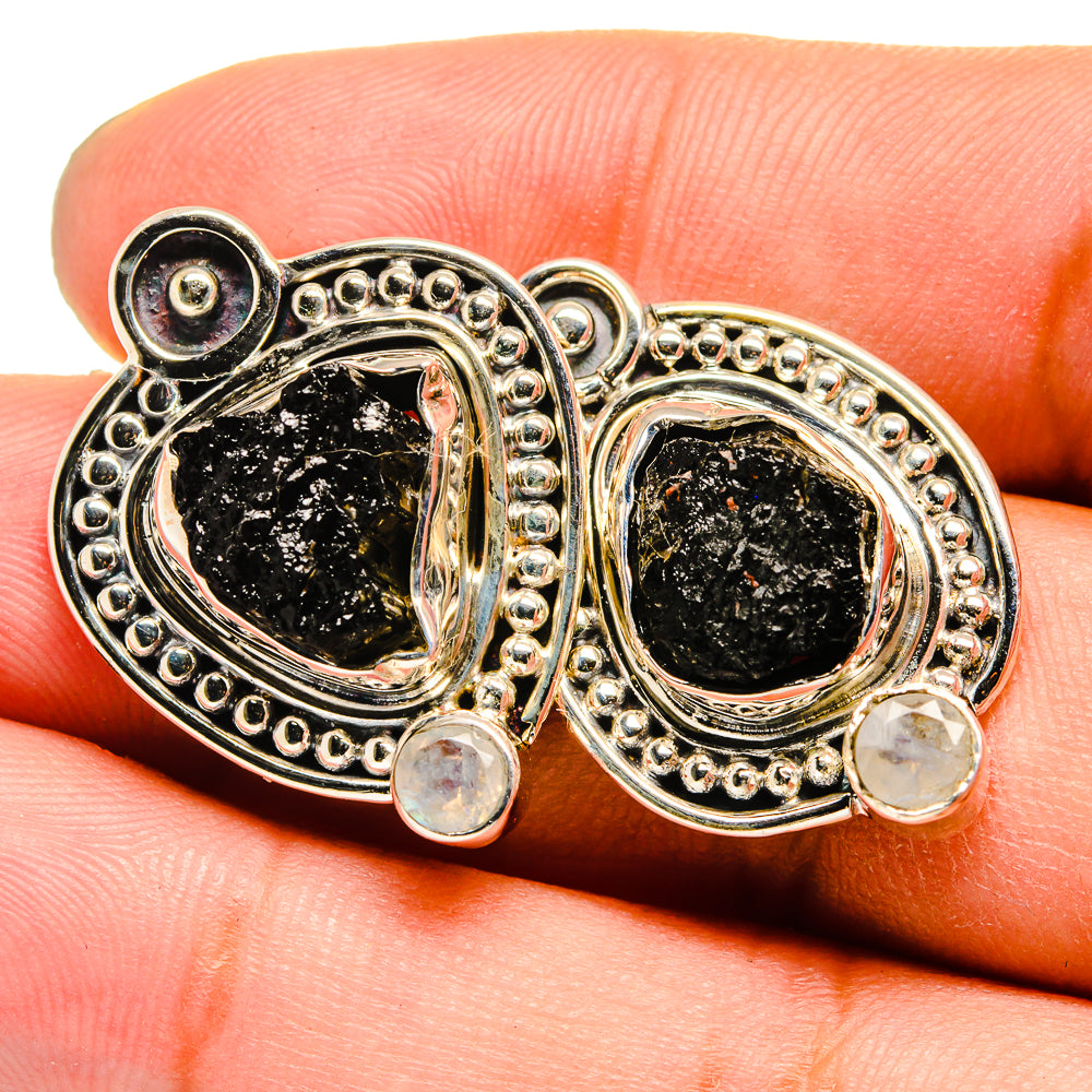 Sterling silver stud earrings with rough dark tourmaline and opalescent moonstone drops