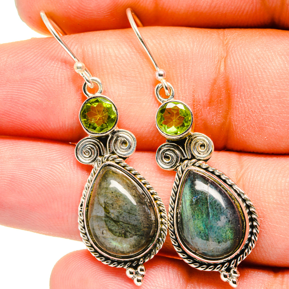 Peridot and labradorite drop earrings with ornate silver setting and hook backs