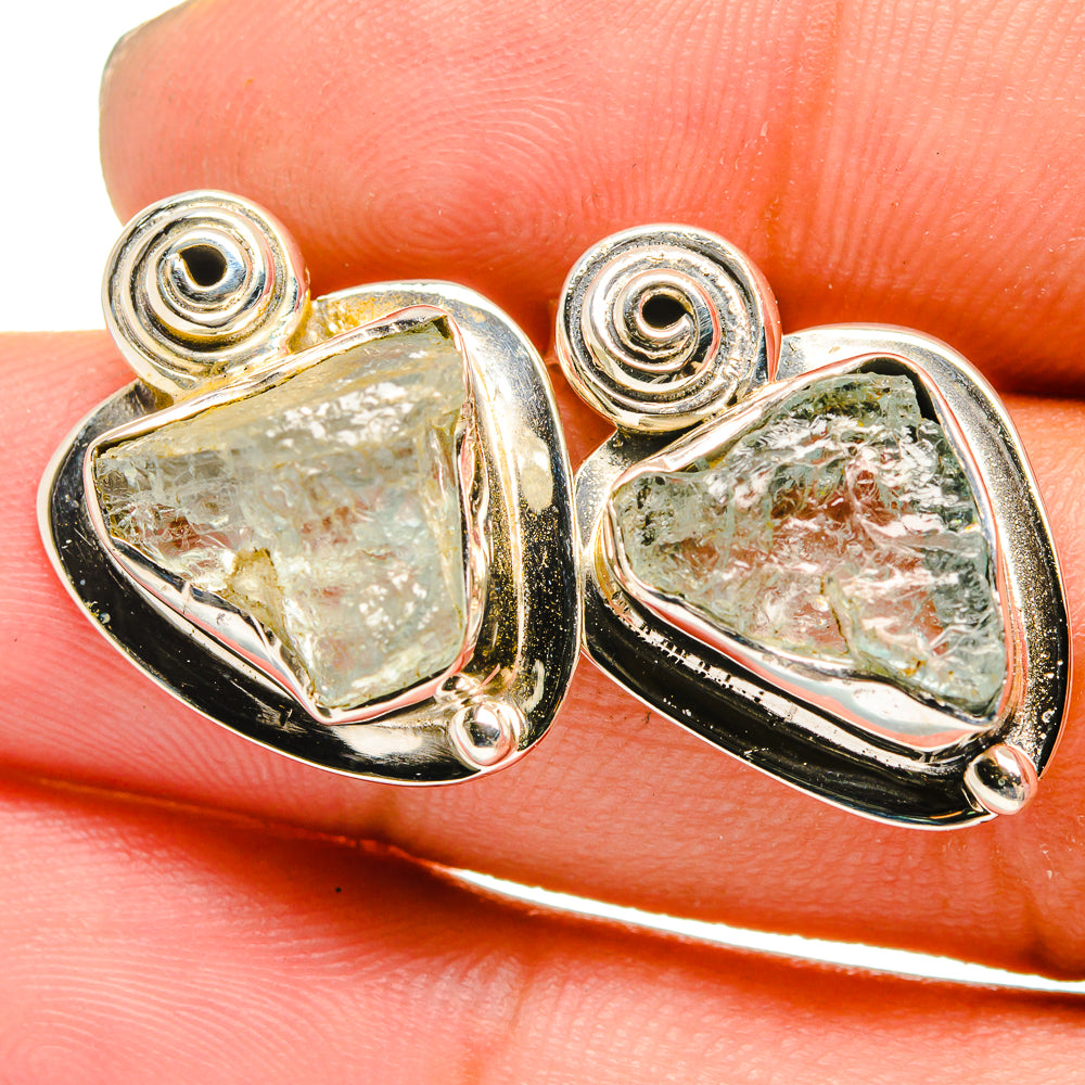 Rough aquamarine gemstone earrings, silver prong bezel settings, circular post backs