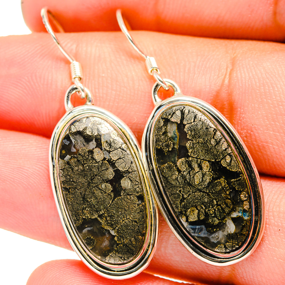 Pyrite agate earrings with oval bezel stones showing gold flecks and dark matrix, silver hooks
