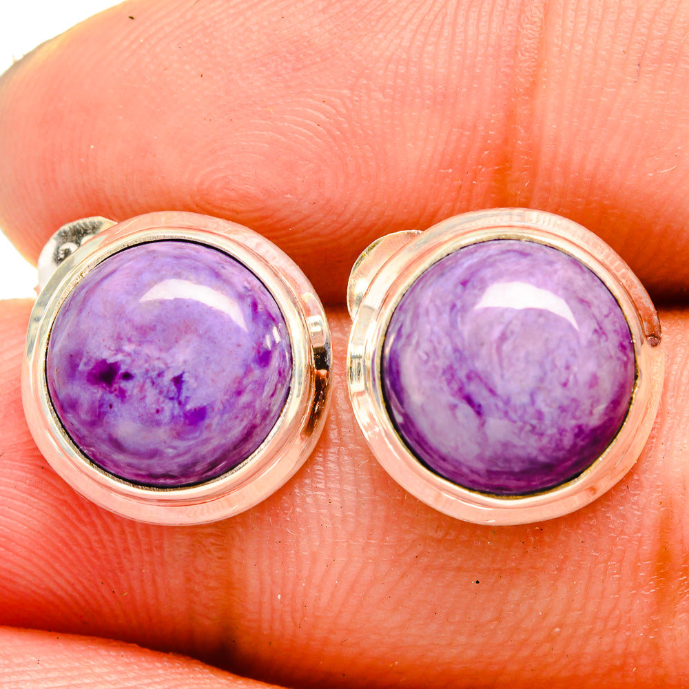 Oval charoite cabochon stud earrings in silver bezel with deep purple stone
