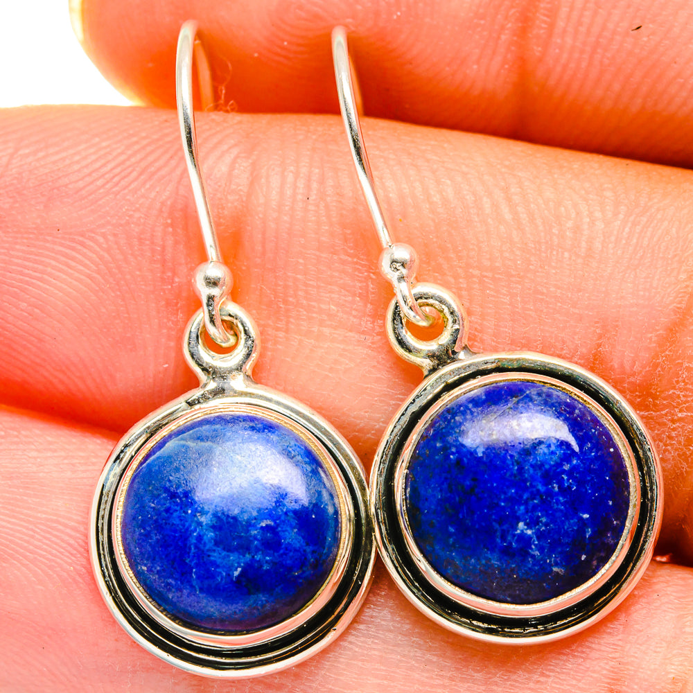 Sterling silver drop earrings with round blue lapis lazuli cabochons
