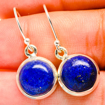 Lapis lazuli drop earrings with round blue stone in silver hook settings