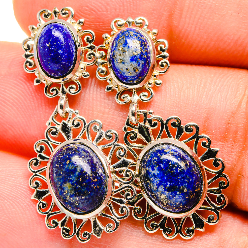 Lapis lazuli earrings with stacked oval and round blue stones in silver filigree