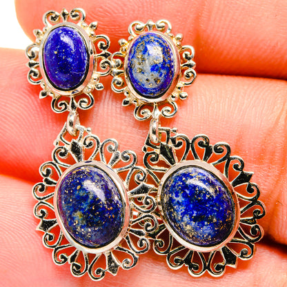 Lapis lazuli earrings with stacked oval and round blue stones in silver filigree