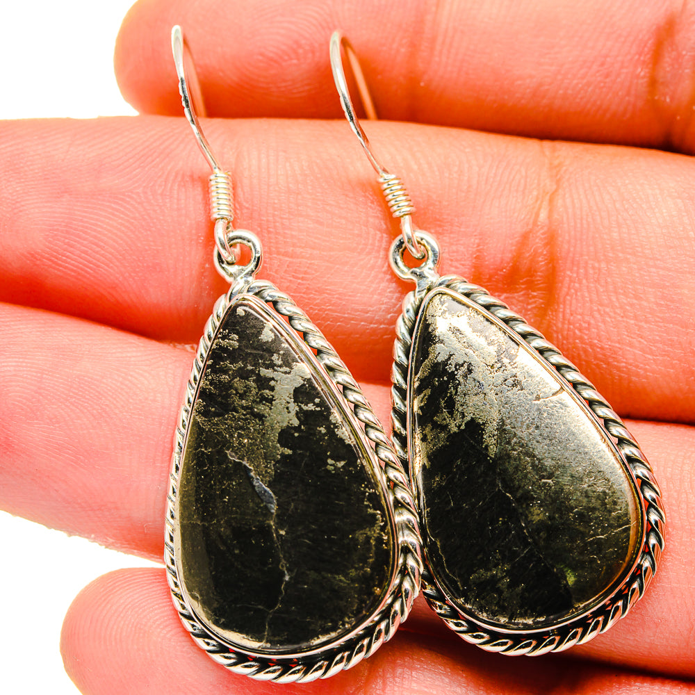 Teardrop pyrite agate earrings with textured black-green stone and braided silver edge