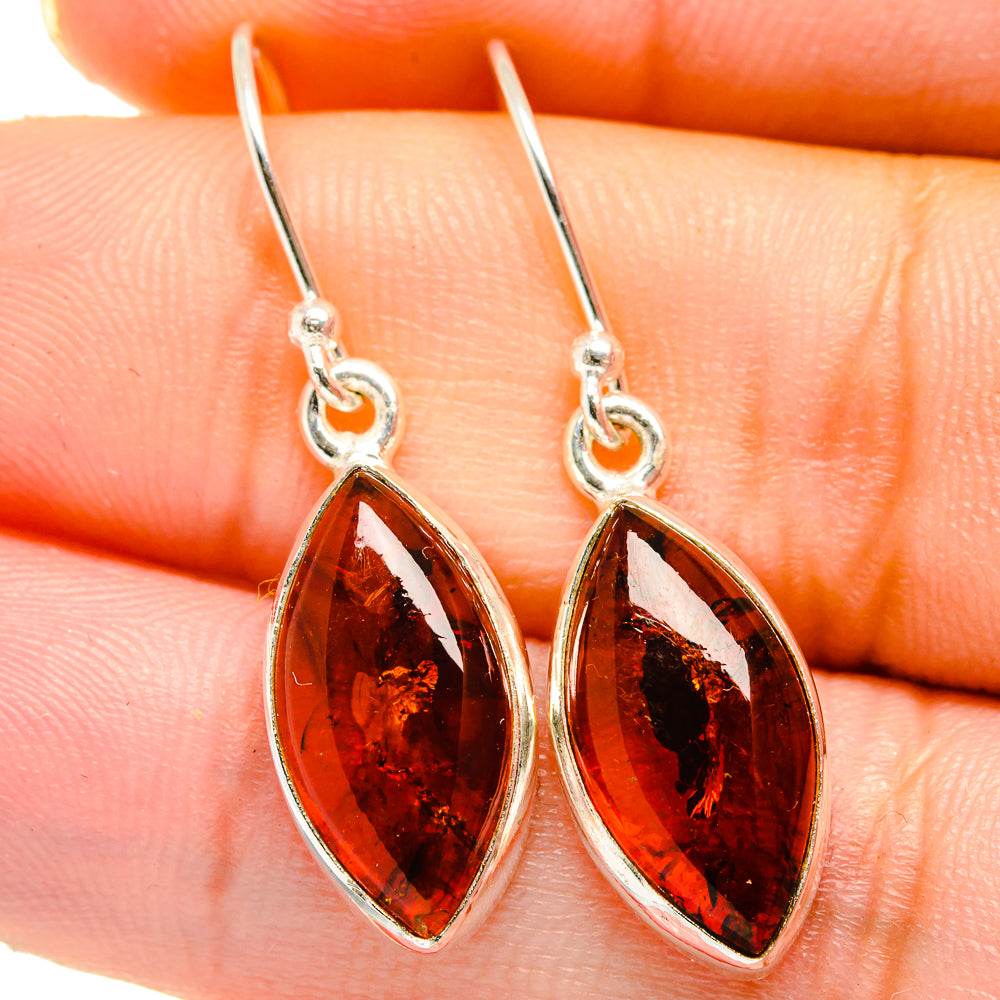 Sterling silver amber teardrop drop earrings with dark red Baltic amber