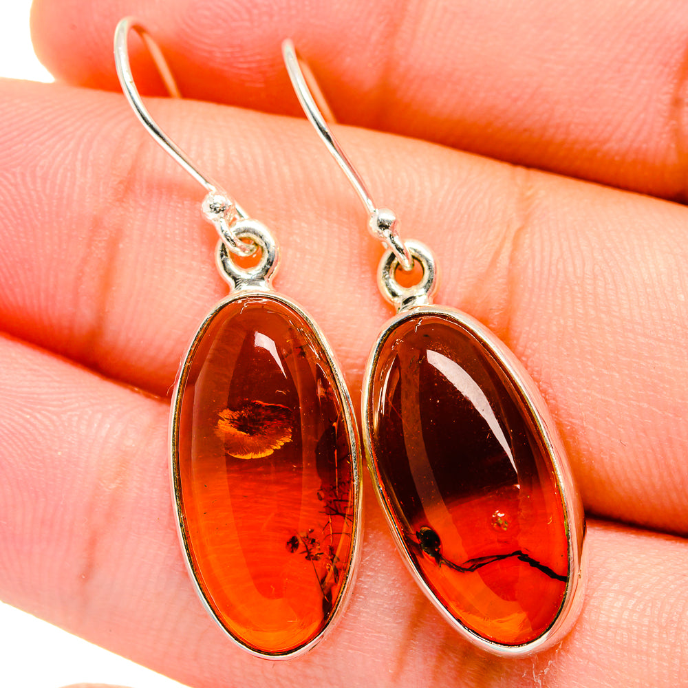 Amber teardrop earrings with 925 sterling silver hooks, orange-brown glossy cabochon