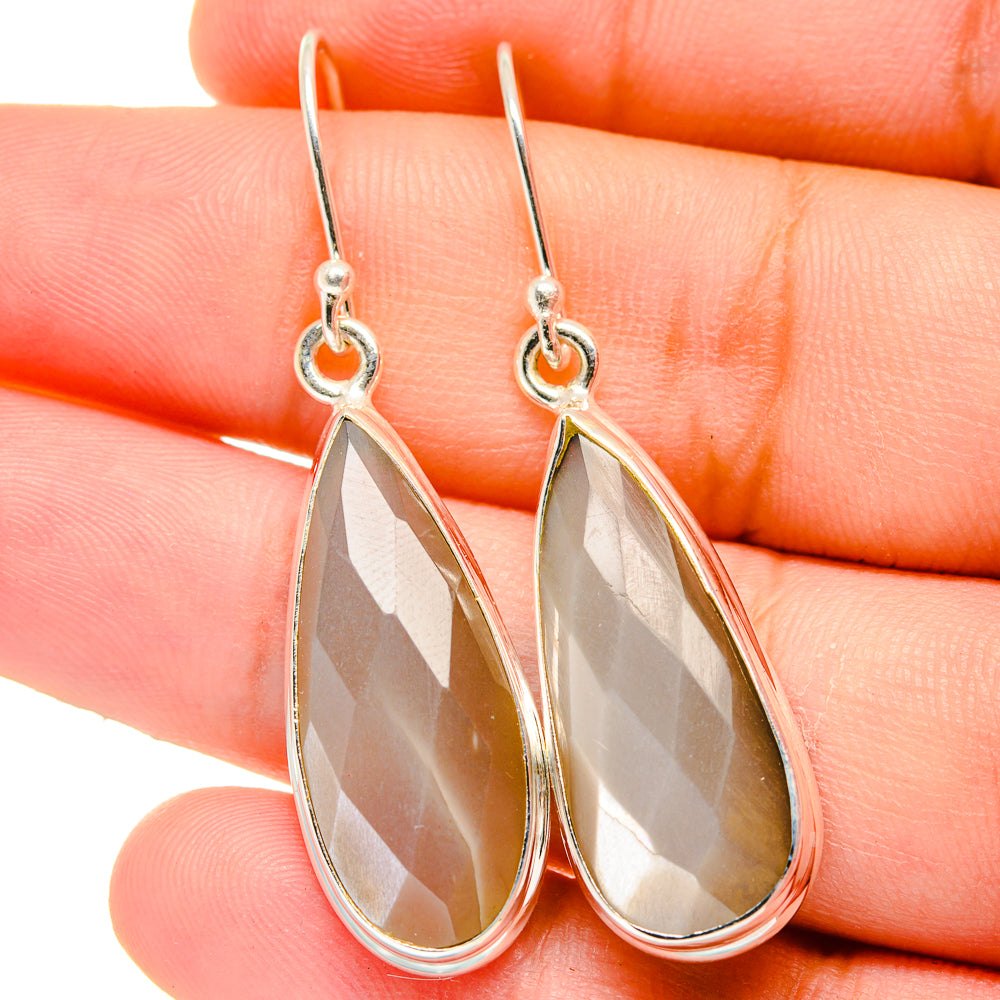 Sterling silver moonstone teardrop earrings with faceted gray stone and hook backs
