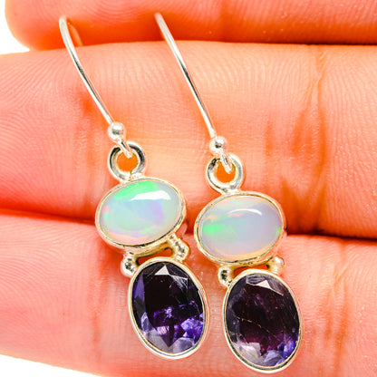 Iridescent opal-top and faceted dark purple oval drop earrings, silver hooks