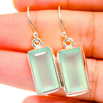 Aqua chalcedony earrings close-up with rectangular bezel-set stones and silver hooks