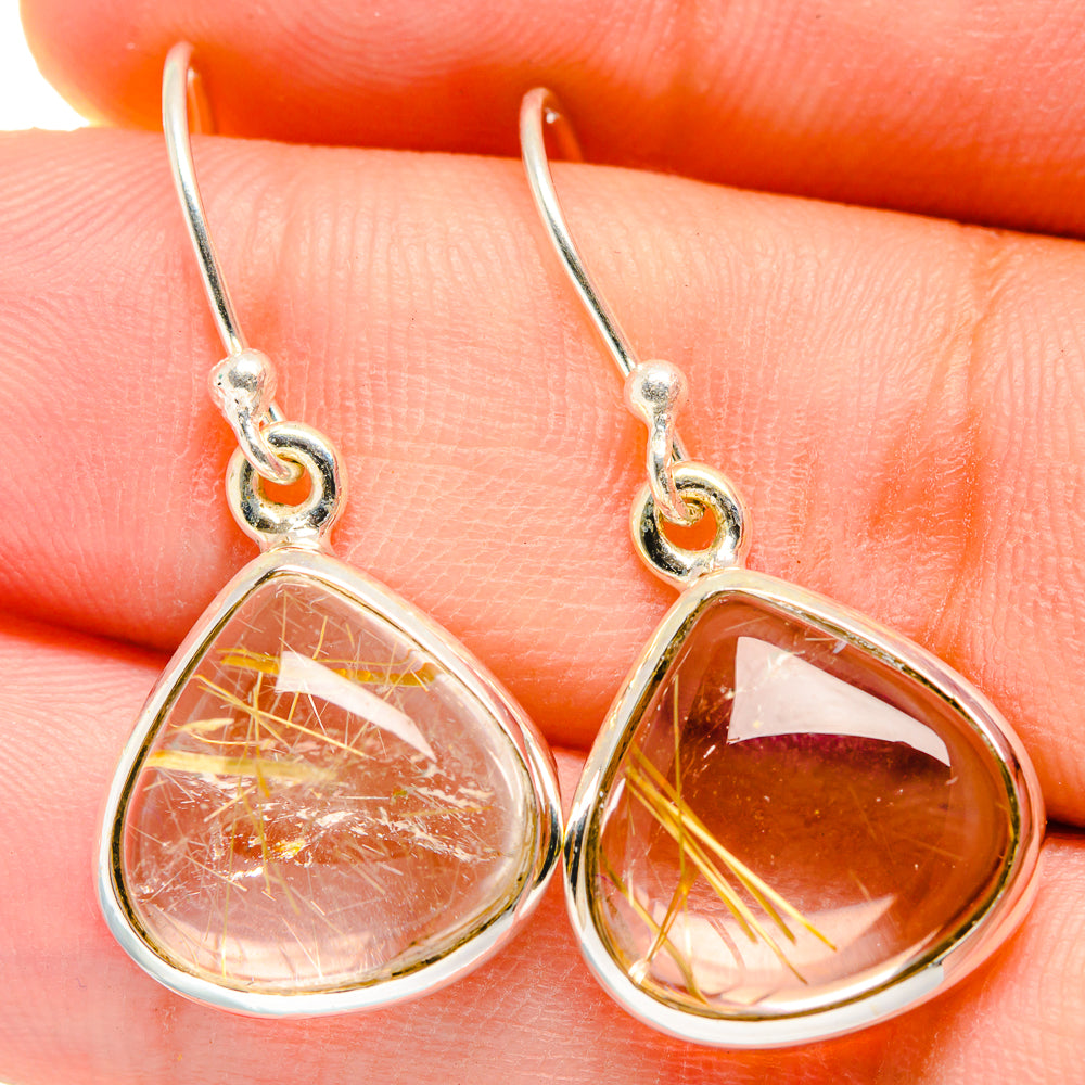 Sterling silver rutilated quartz teardrop earrings with gold wire-like strands, fishhook backs
