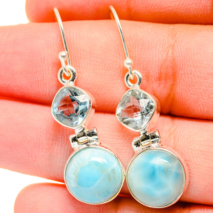 Sterling silver drop earrings with blue topaz and light blue larimar rounds