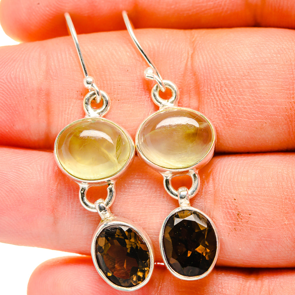 Sterling silver dangle earrings with pale green and smoky quartz round drops