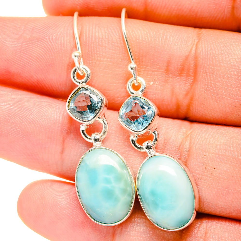 Sterling silver drop earrings with blue topaz top and oval larimar drops