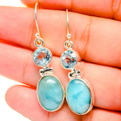 Sterling silver drop earrings: blue topaz round, larimar oval, hook backs