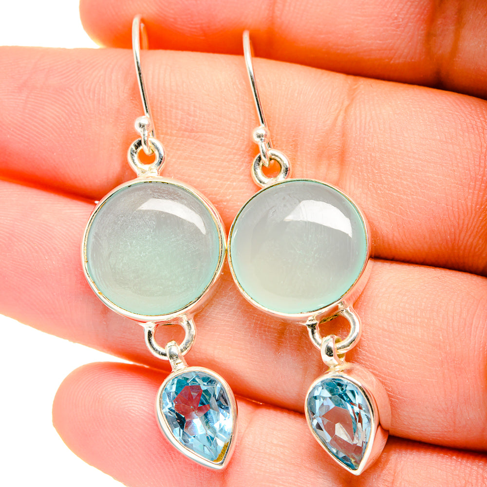 Silver drop earrings with round aqua stones and teardrop blue topaz, on hook backs