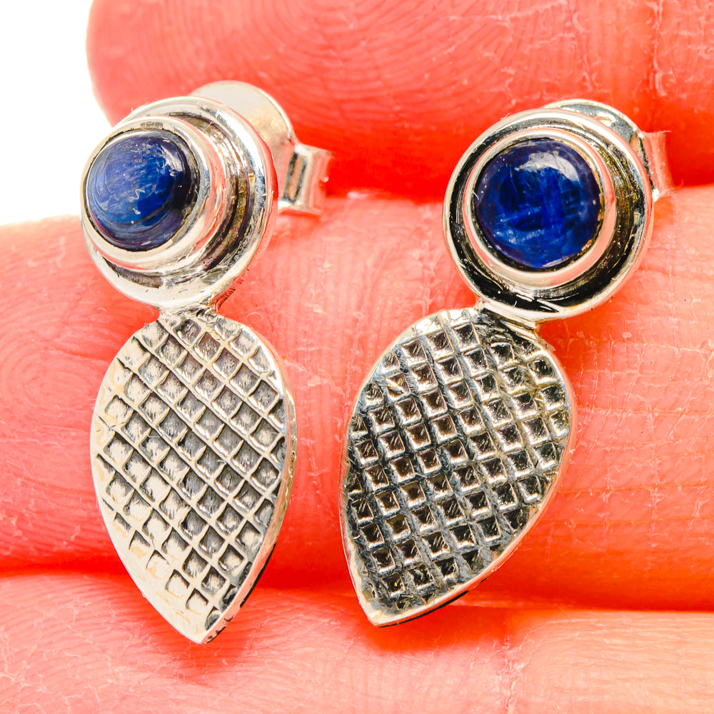Blue kyanite stud earrings with round bezel and textured silver drop plate