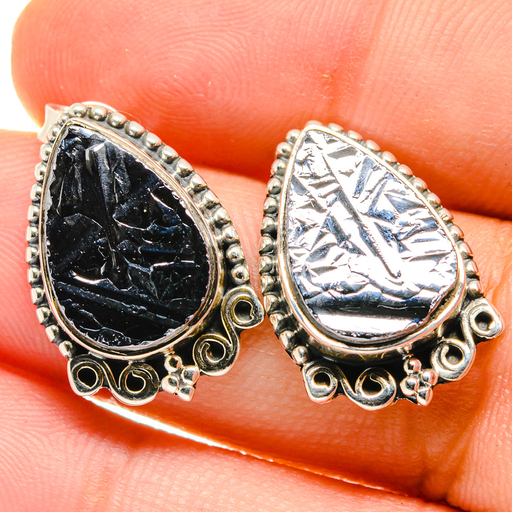 Teardrop shungite earrings with rough black and silver stones in silver filigree bezel