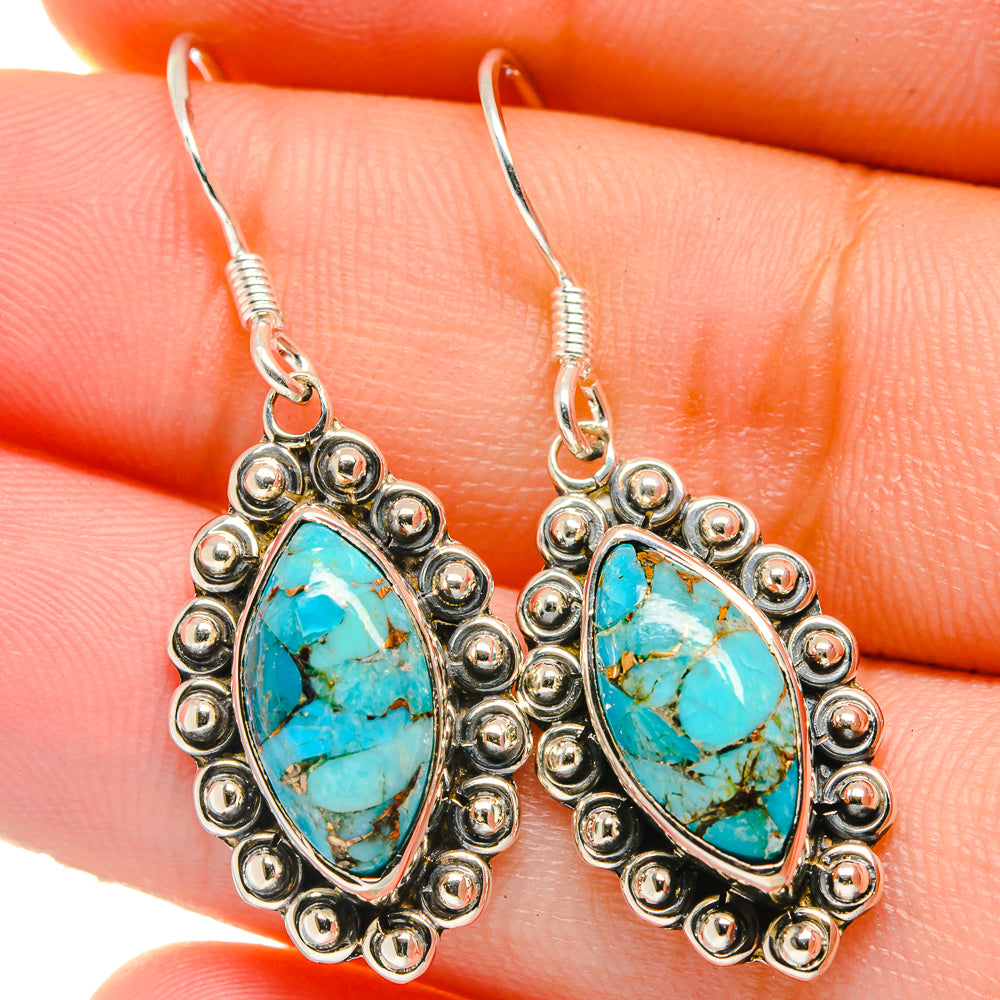 Turquoise teardrop earrings with 925 sterling silver bead-framed settings