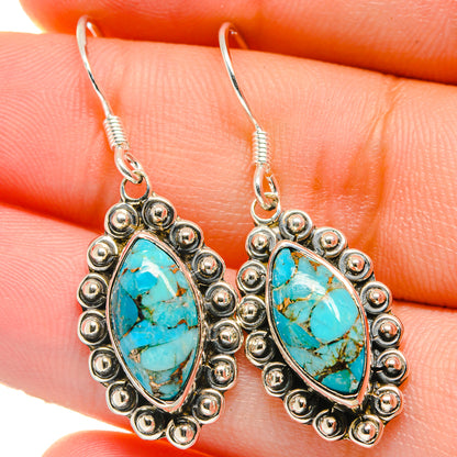 Turquoise teardrop earrings with 925 sterling silver bead-framed settings