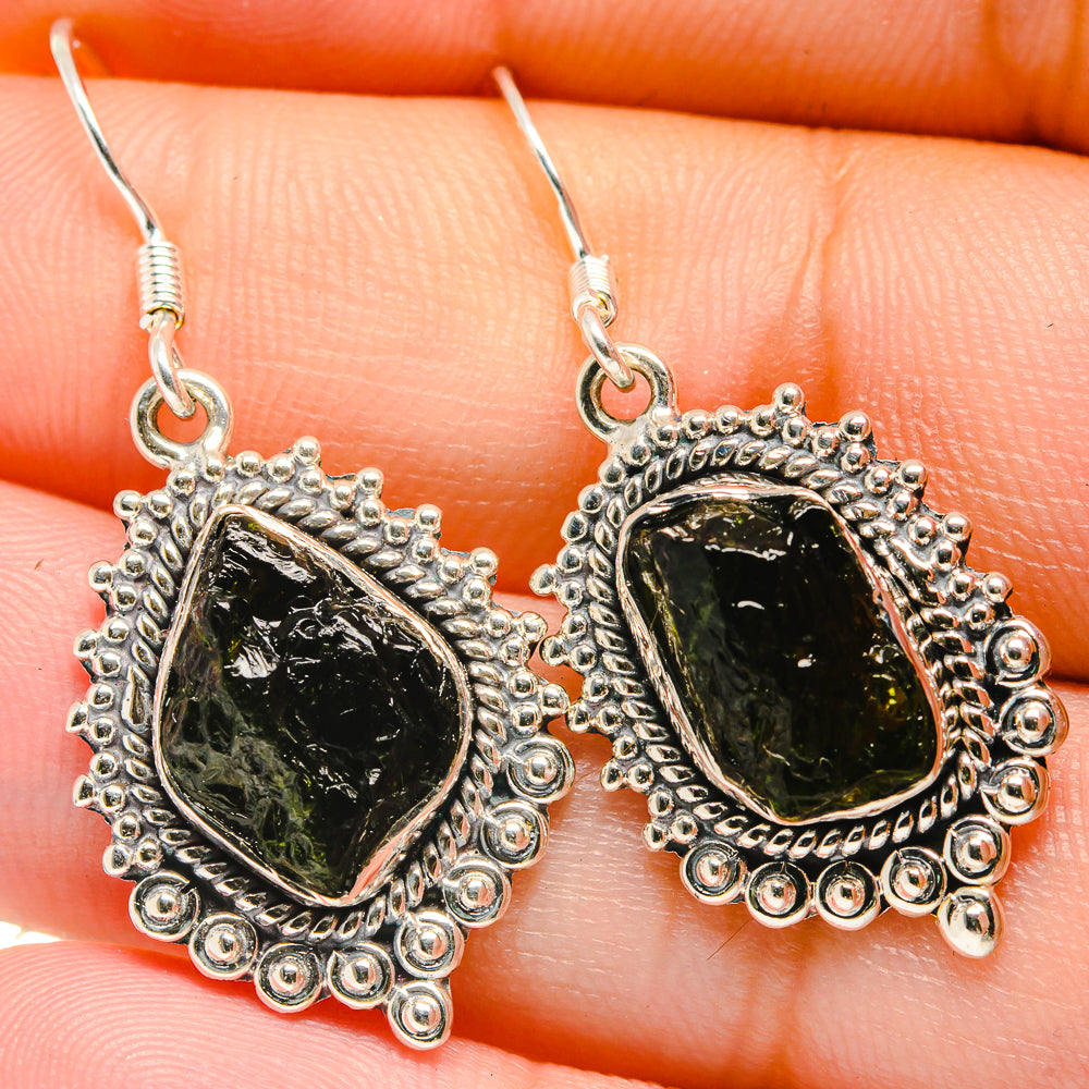 Dark rough diopside earrings with oval bezel and textured sterling silver drop hooks
