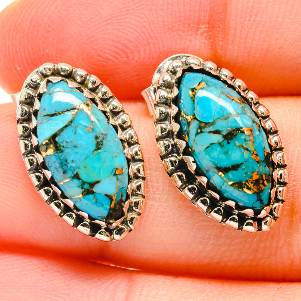 Oval turquoise cabochon stud earrings with ornate 925 sterling silver bezel settings