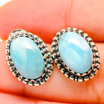 Larimar oval stud earrings, 925 sterling silver, light blue cabochon in textured bezel