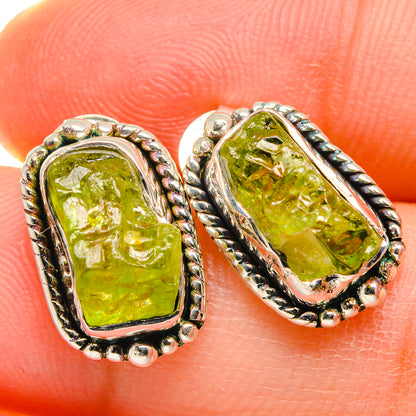 Rough peridot earrings in 925 sterling silver with green textured stones, rope-style bezel