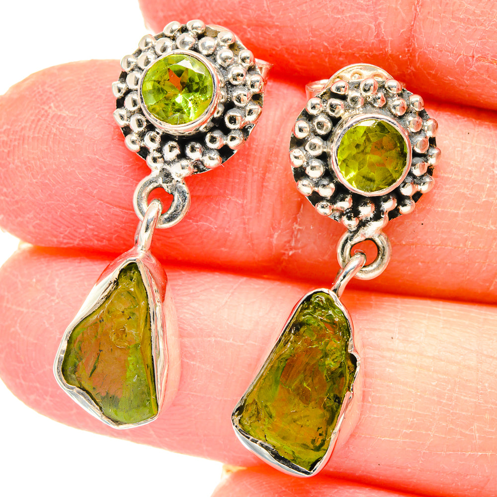 Sterling silver peridot drop earrings with green round studs and rough teardrop dangles