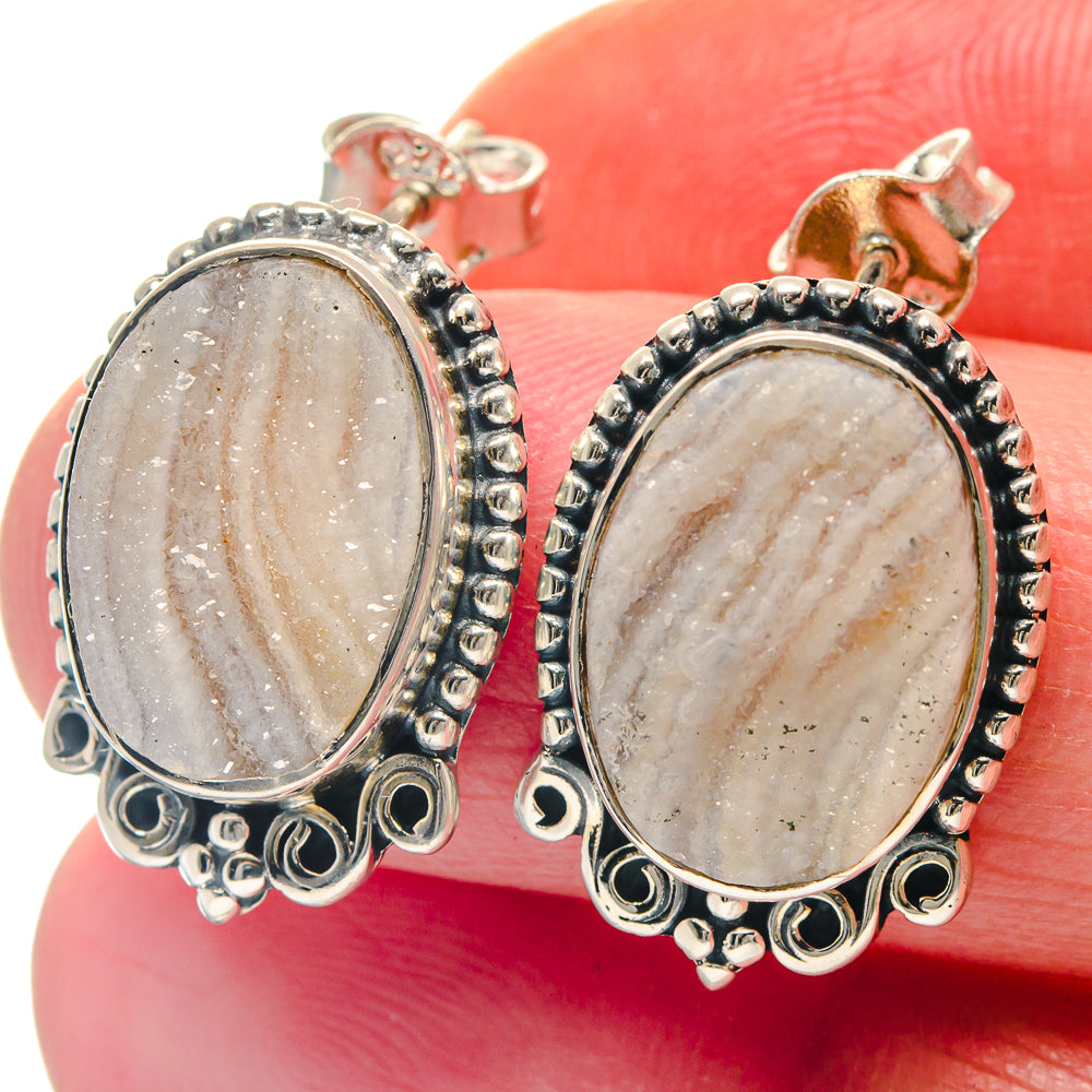 Oval light peach agate earrings with beaded sterling-silver oval frame and scalloped edge