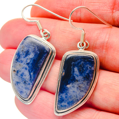 Sterling silver teardrop dangle earrings with blue sodalite cabochon bezels