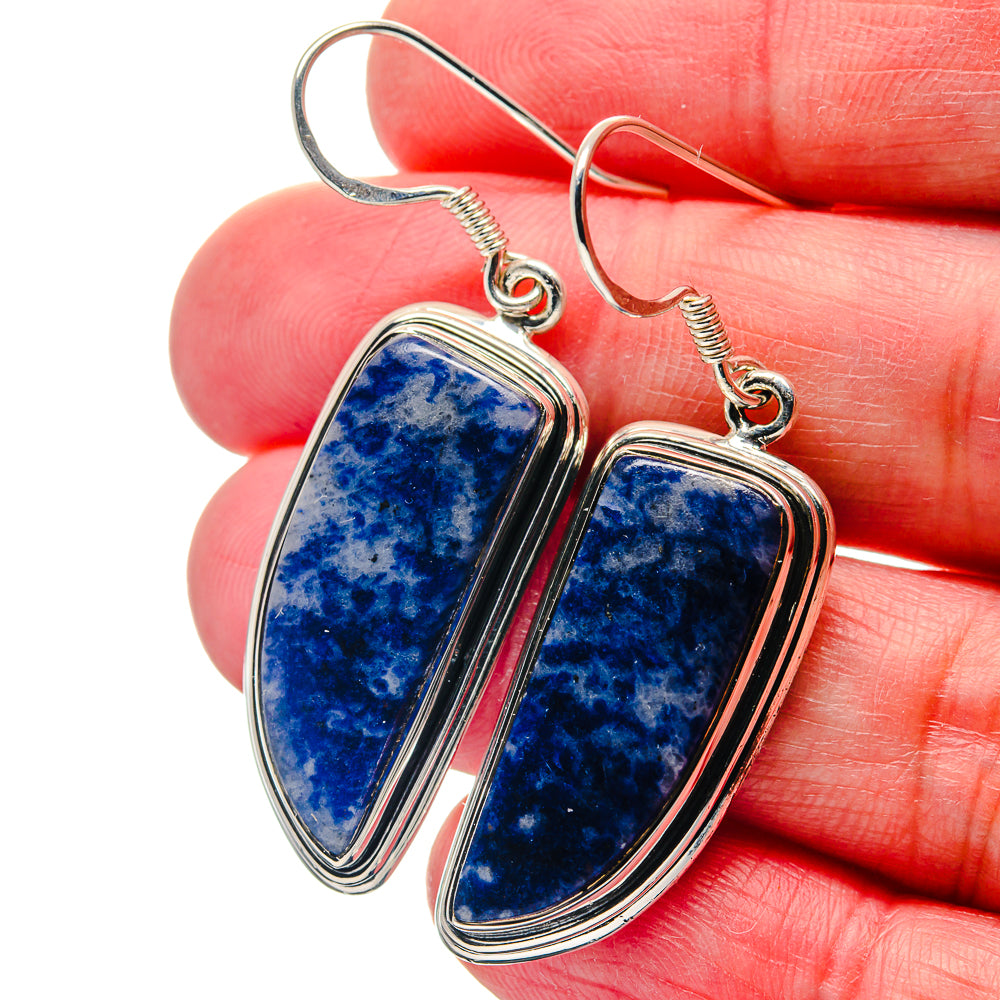 Sodalite earrings, 925 sterling silver with blue teardrop cabochon stones and wire hooks.