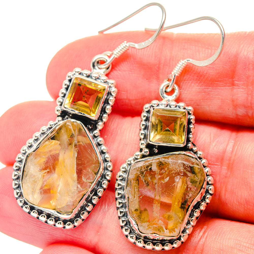 Citrine drop earrings with square top and pear-shaped rough yellow stones in silver frames