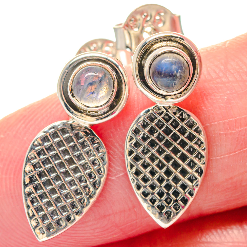 Sterling silver earrings with blue rainbow moonstone cabochons and textured teardrop drops