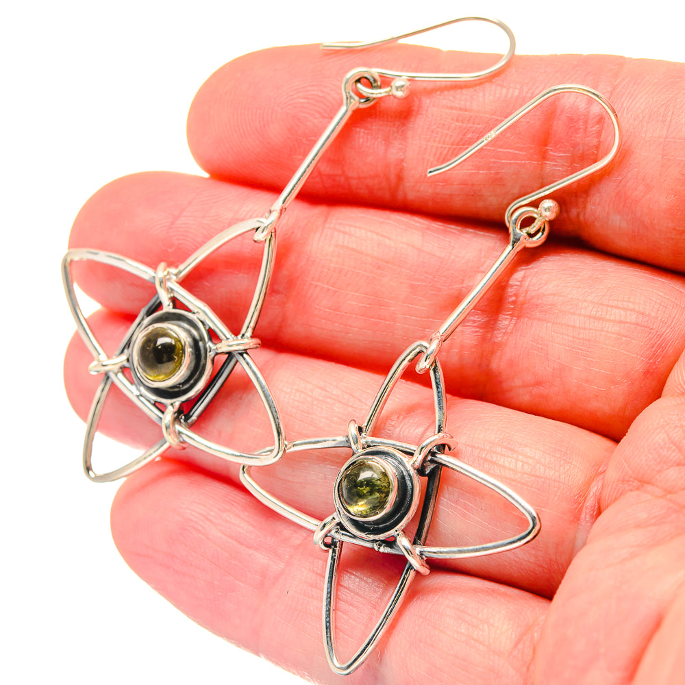 Sterling silver labradorite drop earrings showing round stone in star bezel