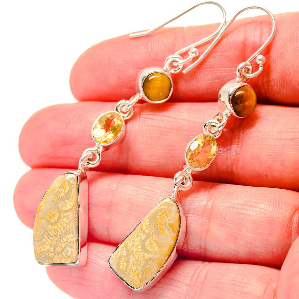 Dangling 925 sterling silver earrings with orange top stones and yellow faceted dangles