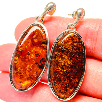 Oval Baltic amber drop earrings in 925 sterling silver, hinged dangles