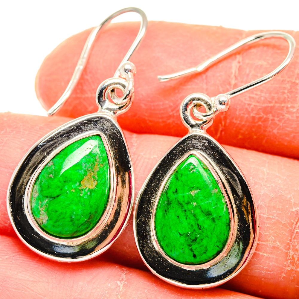 Teardrop silver earrings with bright green stone and black enamel border, hook backs