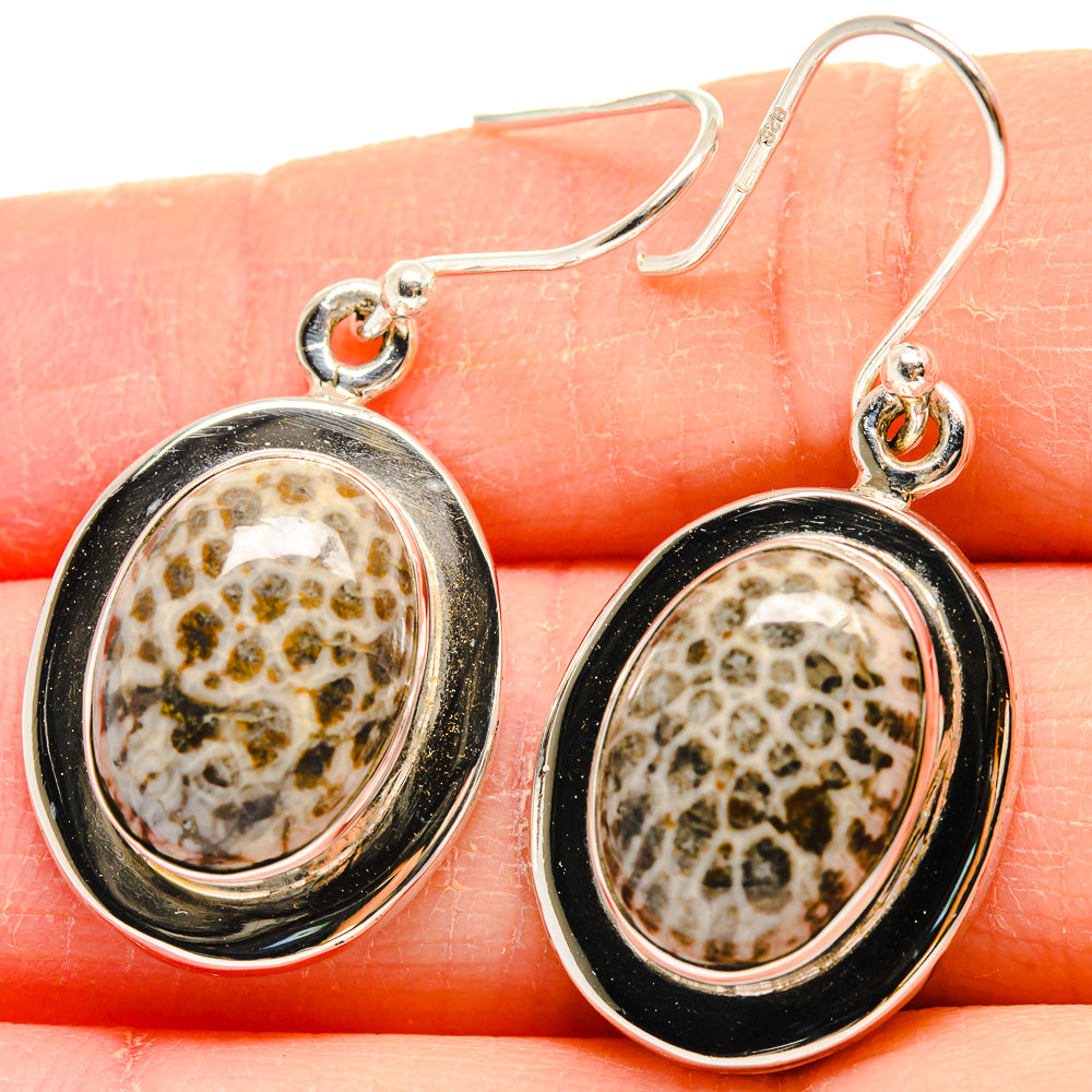 Oval sterling silver drop earrings with coral-like patterned stone and round bezel