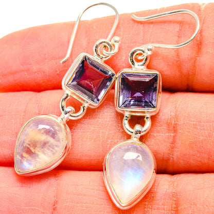 Sterling silver dangle earrings with dark square gemstone and opalescent teardrop moonstones
